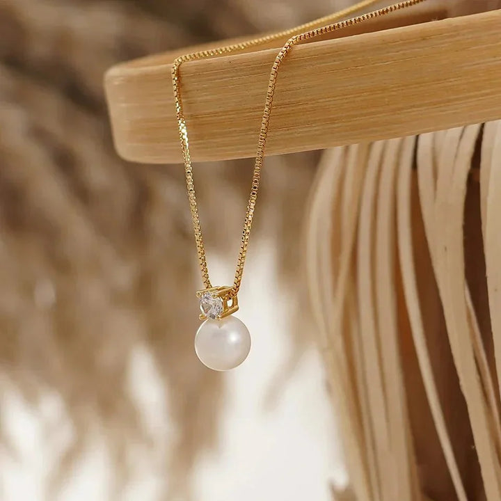 PENDENTIF MADELEINE EN PERLE