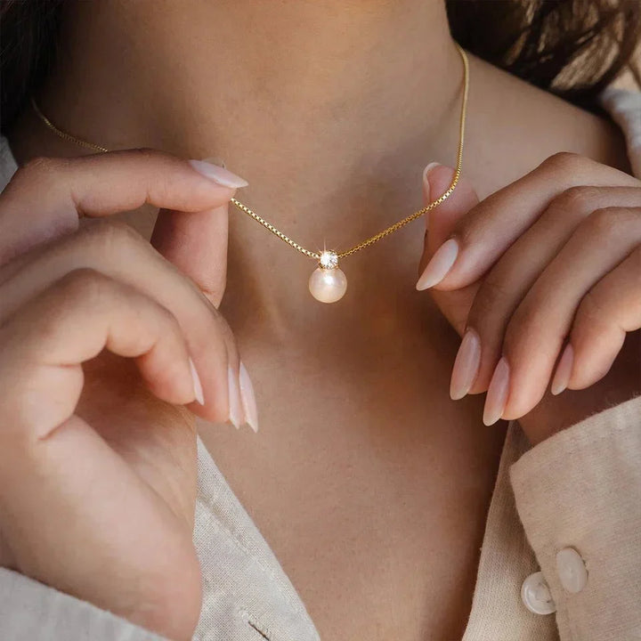 PENDENTIF MADELEINE EN PERLE