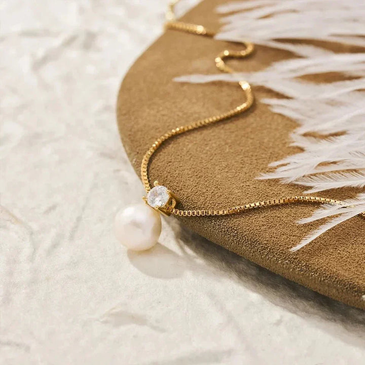 PENDENTIF MADELEINE EN PERLE