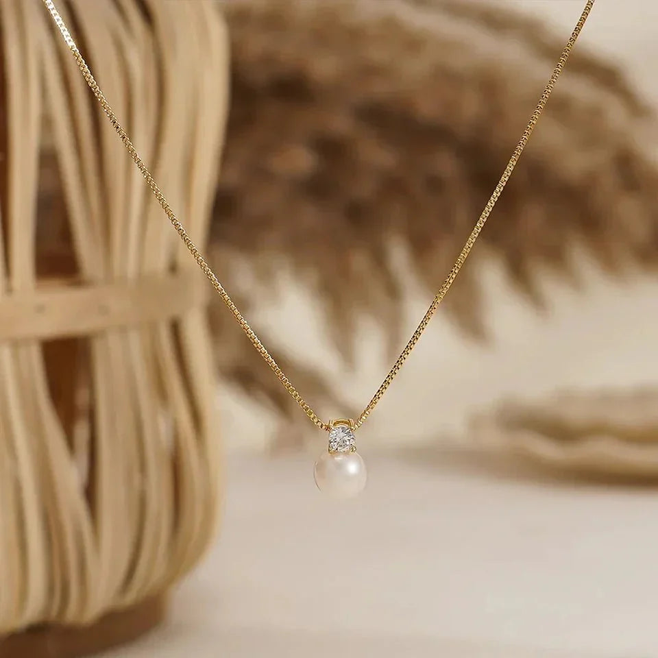 PENDENTIF MADELEINE EN PERLE