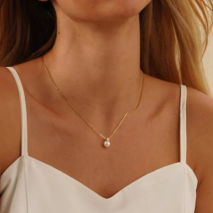 PENDENTIF MADELEINE EN PERLE