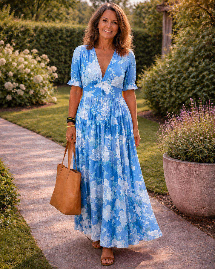 Auvelle | Robe midi fleurie sans manches à col en V